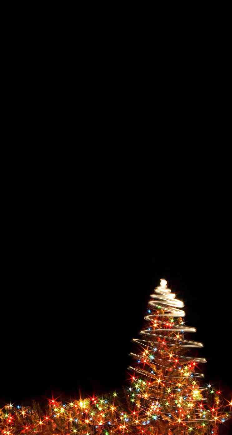 クリスマスの壁紙を貼るトピ