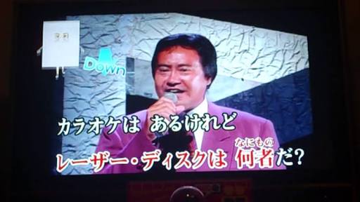 あるMV(ミュージックビデオ)の画像を貼って歌手と曲名が分かったらプラスを押すトピ