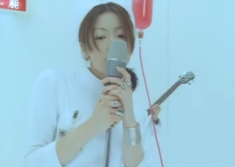 あるMV(ミュージックビデオ)の画像を貼って歌手と曲名が分かったらプラスを押すトピ