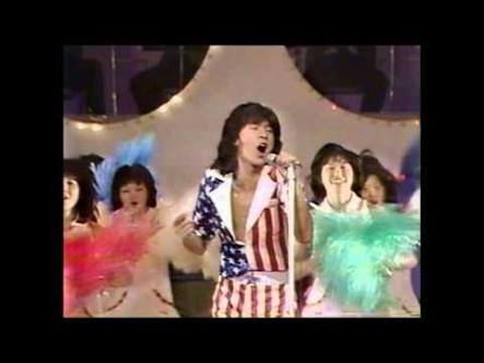 あるMV(ミュージックビデオ)の画像を貼って歌手と曲名が分かったらプラスを押すトピ