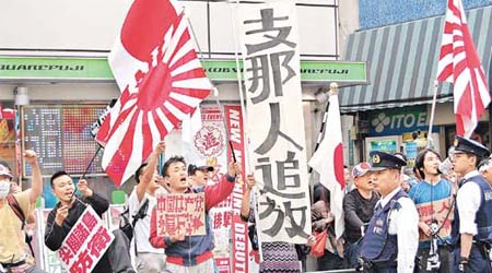 旭日旗に「日本人のど根性」のテスト 中学が回収し謝罪へ