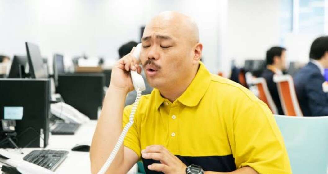 受話器持ってる画像