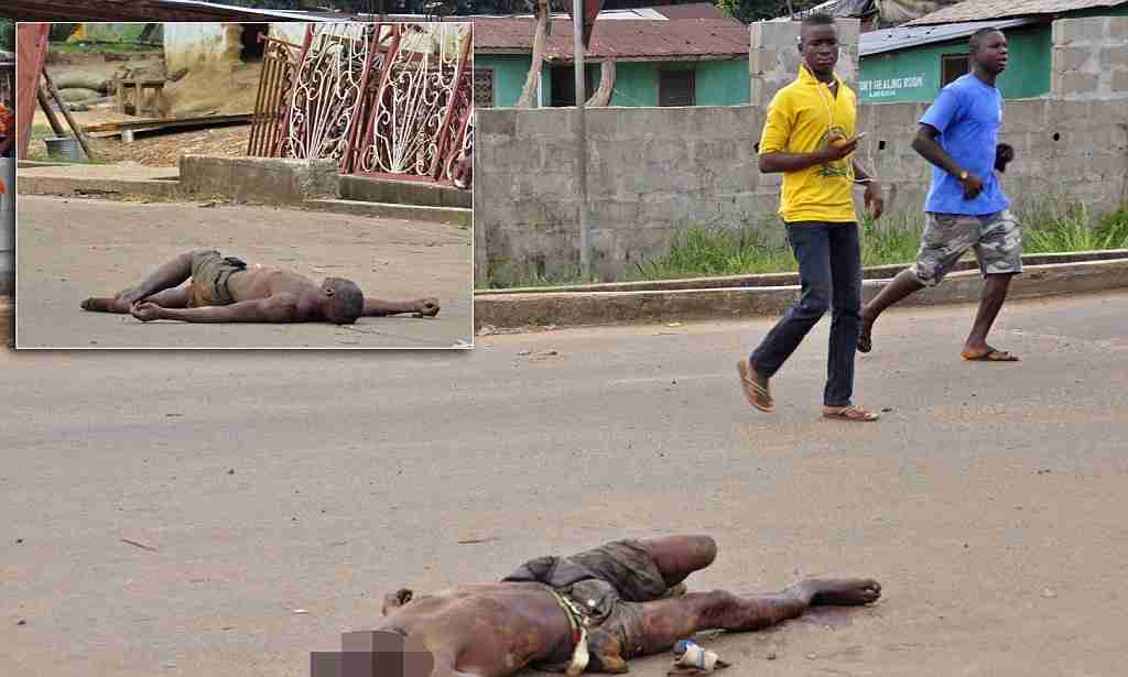 Ebola victims left to rot in Liberia streets as relatives are scared of catching deadly virus | Mail Online