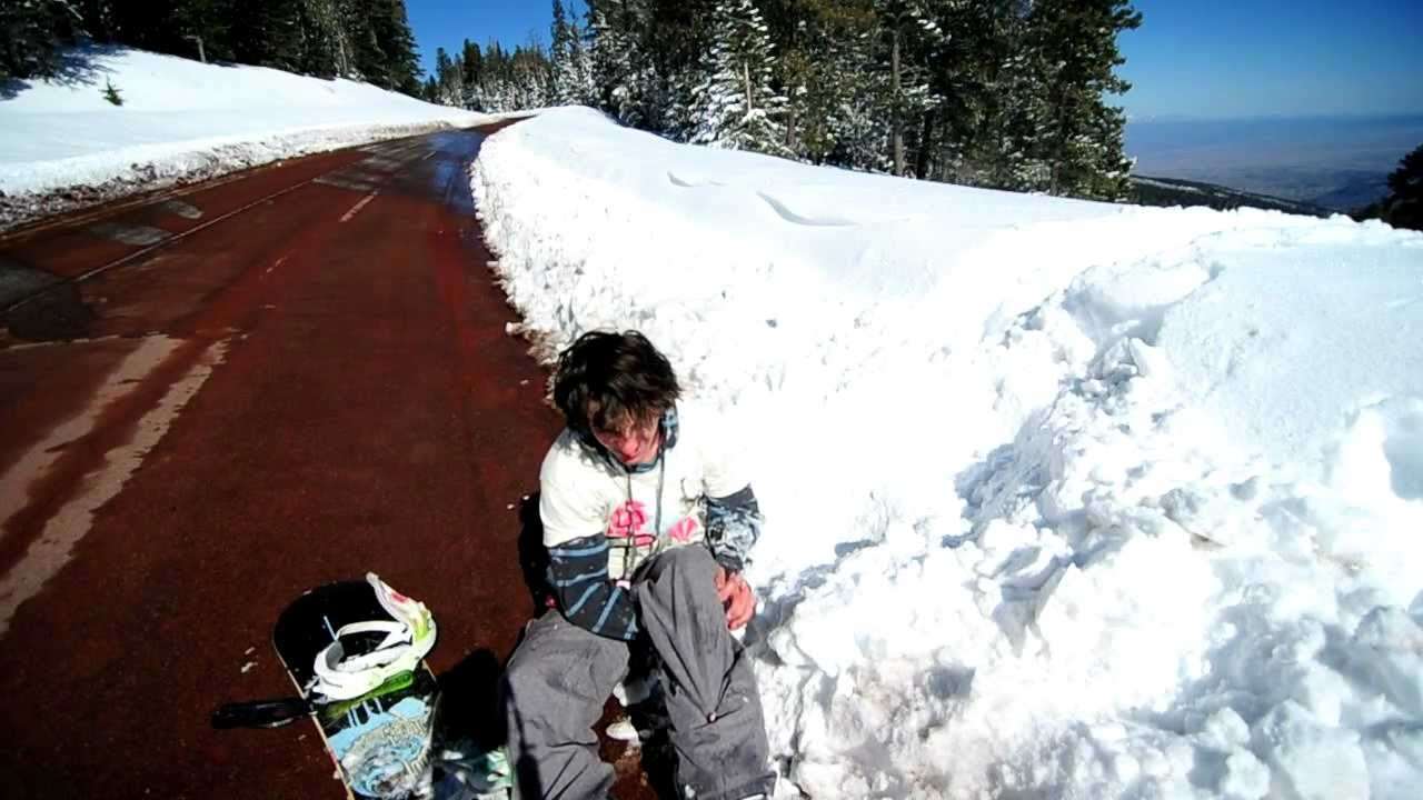 Snowboarder breaks leg attempting road gap - YouTube
