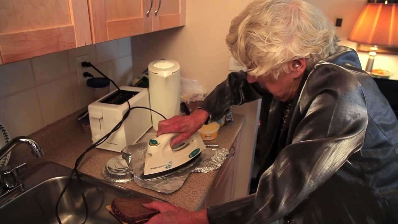Hilarious - Grandma cooks grilled cheese sandwich with an iron! Cyber-Seniors Corner - YouTube