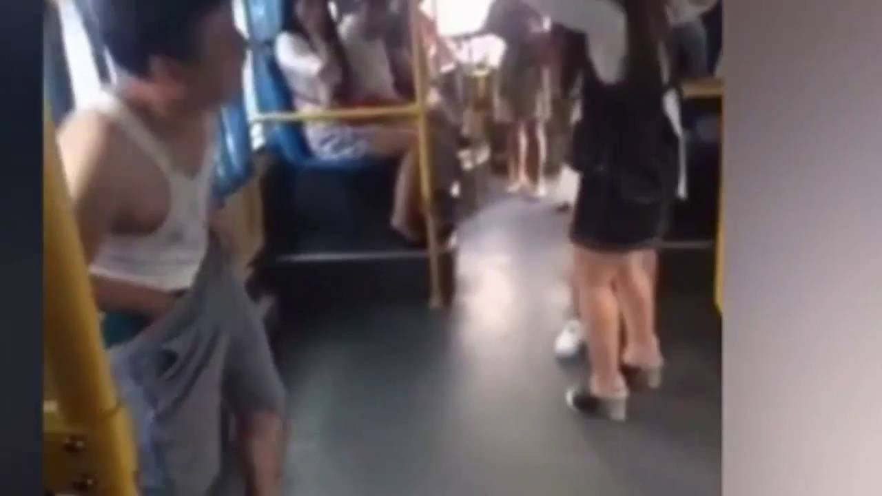 Funny video, Woman slips and grabs hold of a man's shorts as they travel on the bus - YouTube
