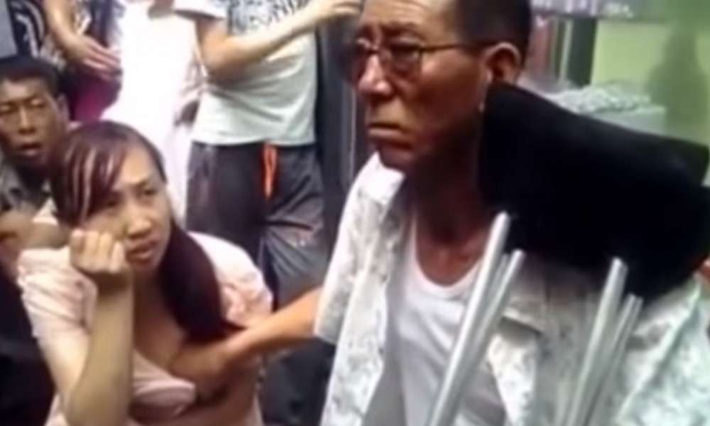 Mystical Chinese Man Claims He Can Predict a Woman's Future by Fondling Her Breasts