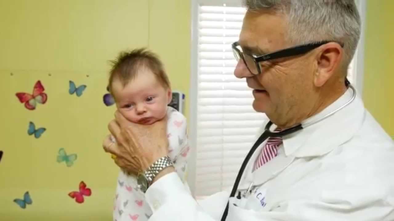 How To Calm A Crying Baby - Dr. Robert Hamilton Demonstrates "The Hold" (Official) - YouTube