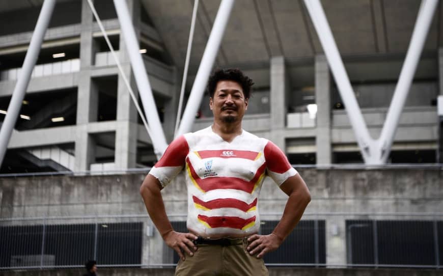 Rugby superfan 'Bak-san' becomes World Cup sensation with body-painted jerseys | The Japan Times
