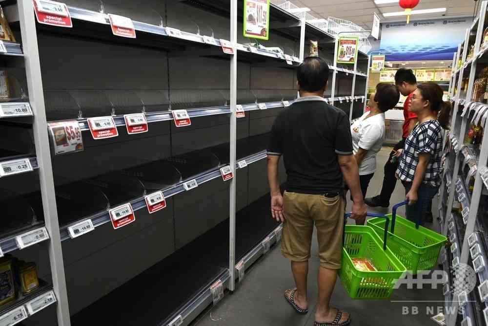 シンガポールで買いだめ騒動、新型ウイルスの警戒レベル引き上げで　写真10枚　国際ニュース：AFPBB News