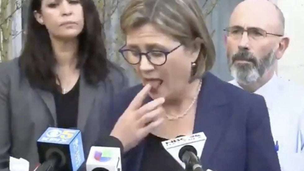 Health official goes viral after licking finger during coronavirus briefing | TheHill
