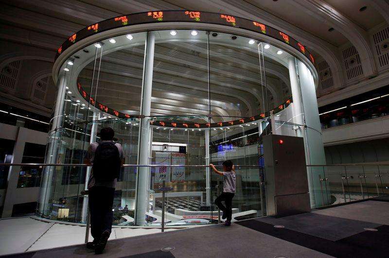                 日経平均が2万円台回復：識者はこうみる - ロイター
