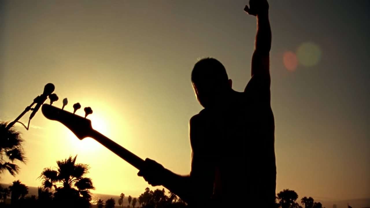 Red Hot Chili Peppers - The Adventures of Rain Dance Maggie [Official Music Video] - YouTube