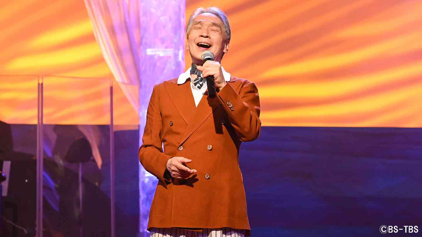 おっさんが熱唱している写真トピ