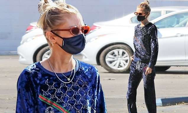 Stella Maxwell drapes her model figure in a Gucci velour tracksuit as she runs errands in LA | Daily Mail Online