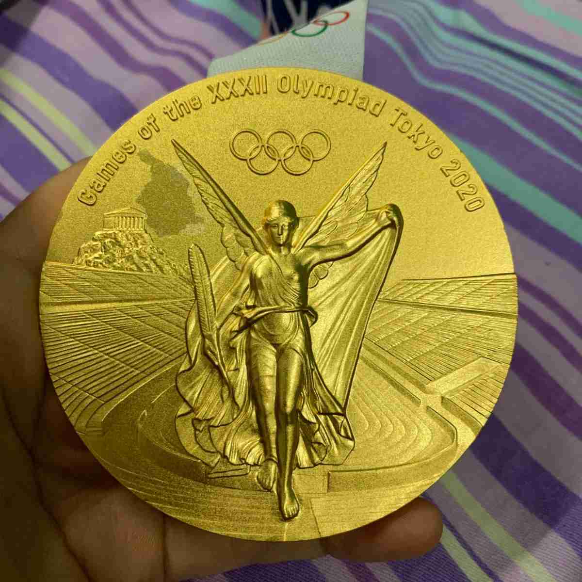 金メダルの表面剥がれる タイ五輪選手、交換訴え