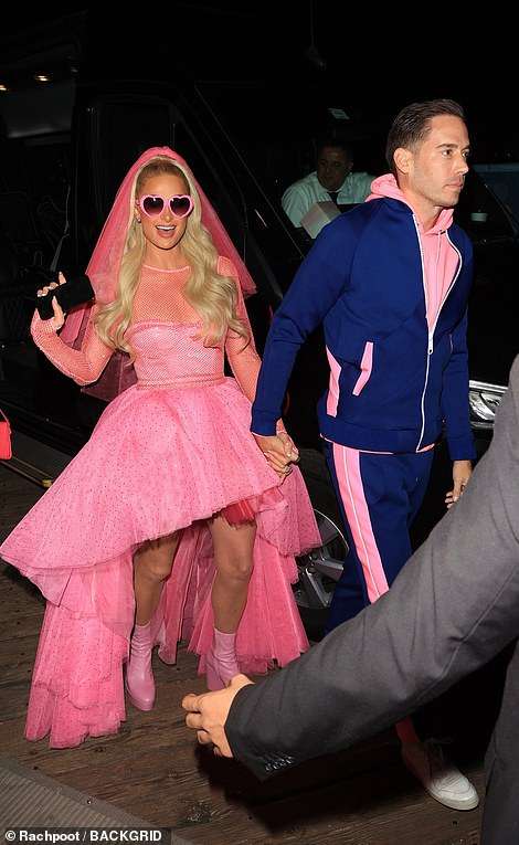 Paris Hilton wows in a NEON pink bridal gown beside husband Carter Reum at wedding carnival - Times News Network