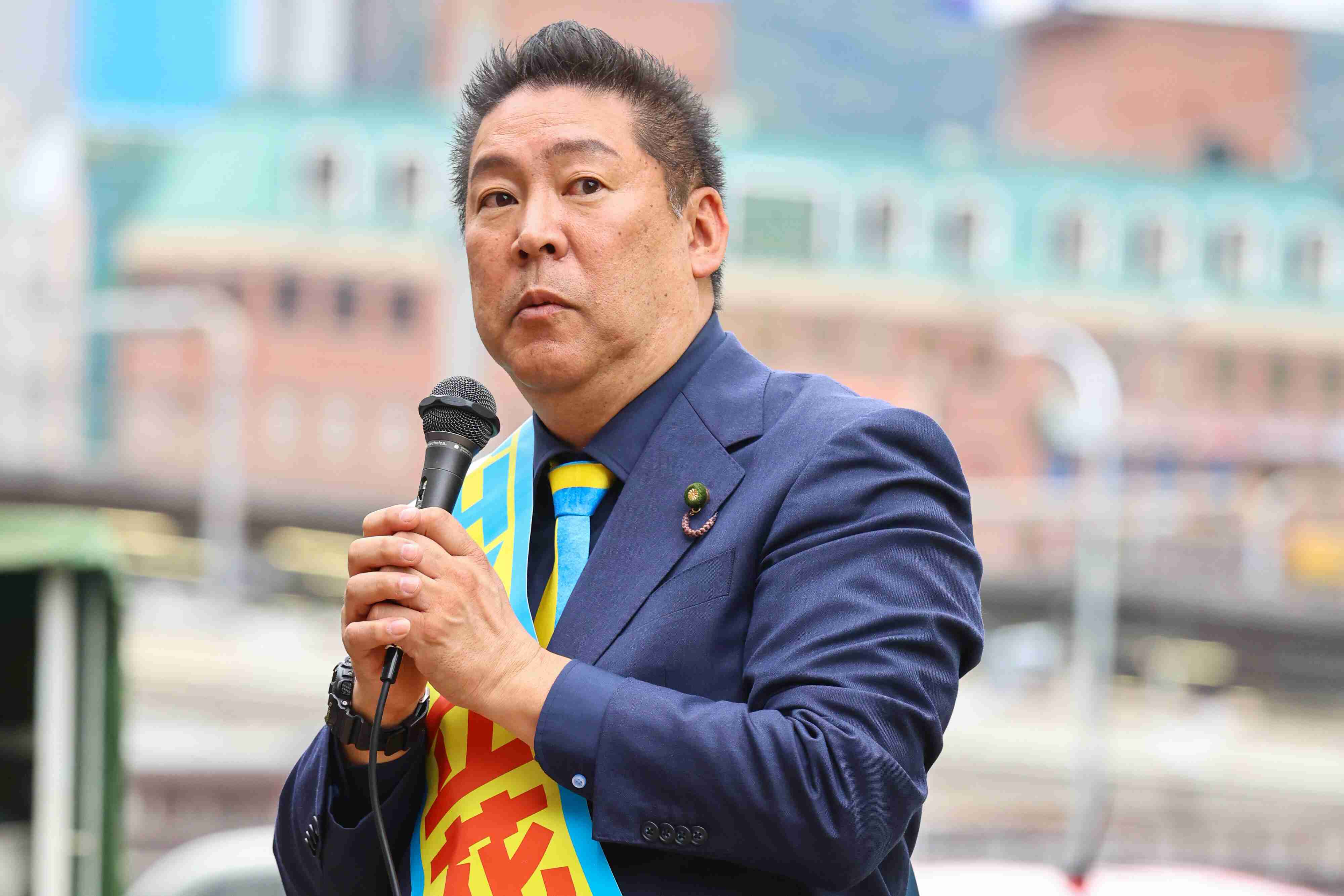 ナタ襲撃男は「計画犯」だったのか　NHK党・立花党首が写真付きで指摘「船橋の街頭演説にも、来ていました！」: J-CAST ニュース