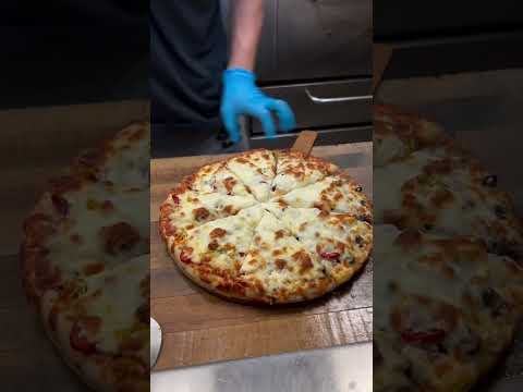 Smooth Pizza Cutting Satisfaction ? #Pizza #PizzaCutting #PizzaLovers #CheesyPizza #PizzaSlices